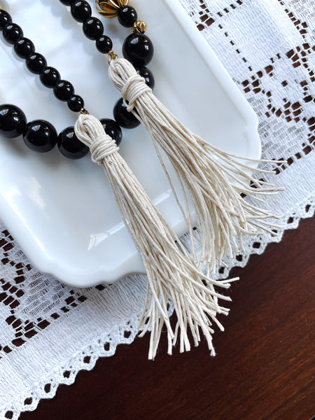 Black, Gold, and White Tassel Beaded Accent Garland