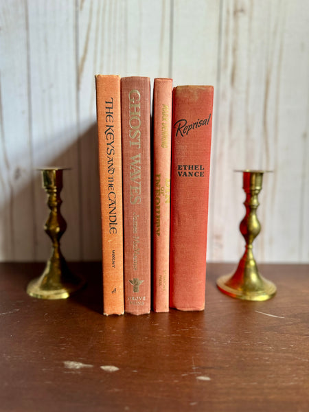 Shades of Coral and Orange Book Stack