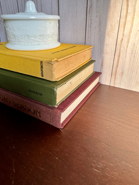 Green, Brown, and Yellow Book Stack